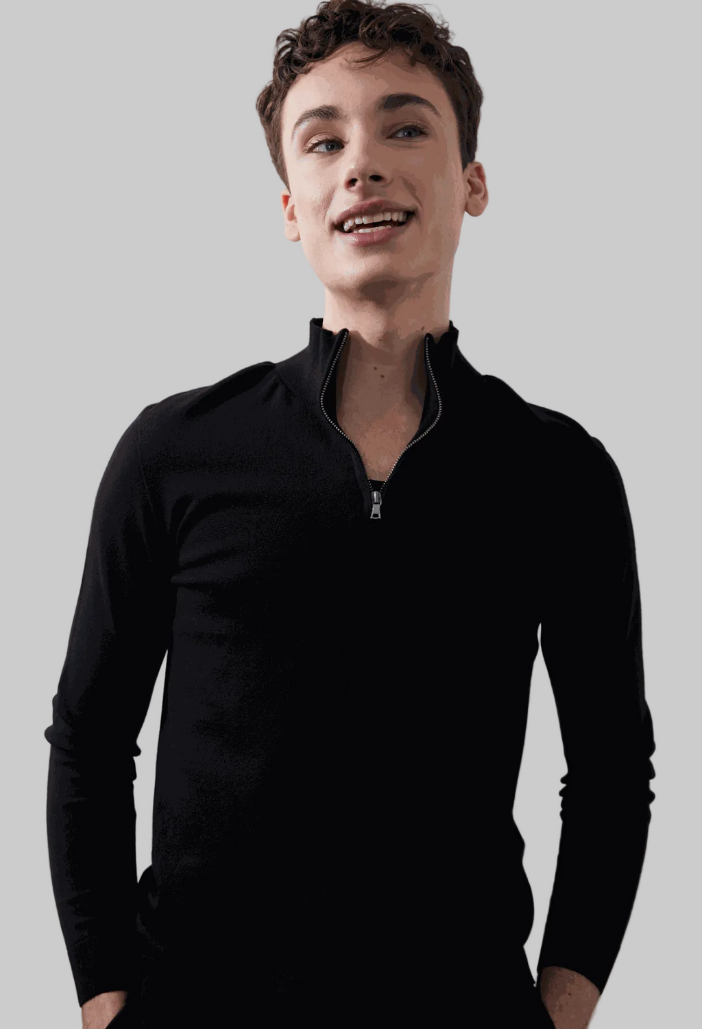 Nash Zip Pullover in black, featuring a quarter zip collar and ribbed cuffs, made from eco-friendly EcoViscose.