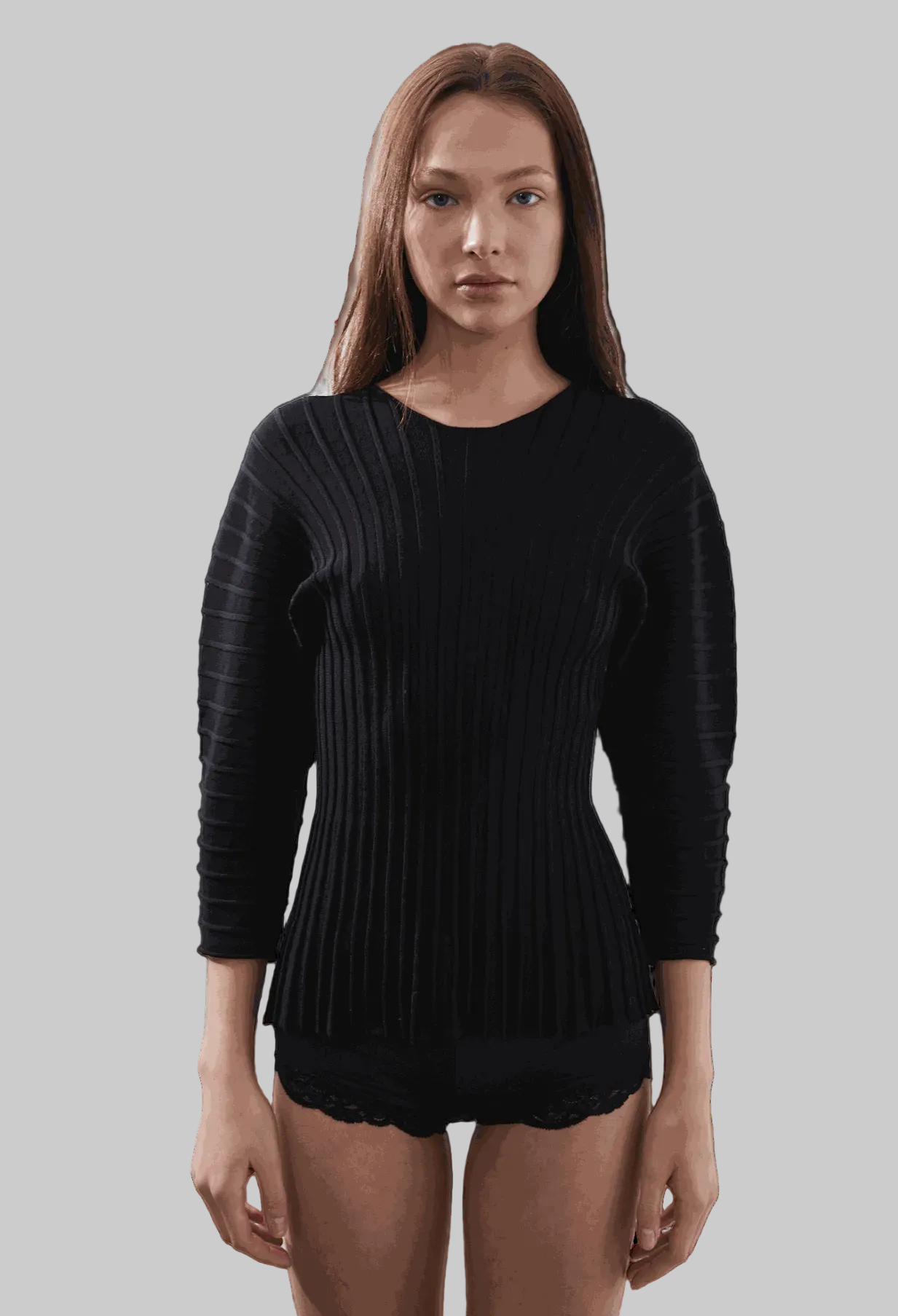 Hewal Pullover in black, featuring 3/4 dolman sleeves and fitted bodice, worn by model.