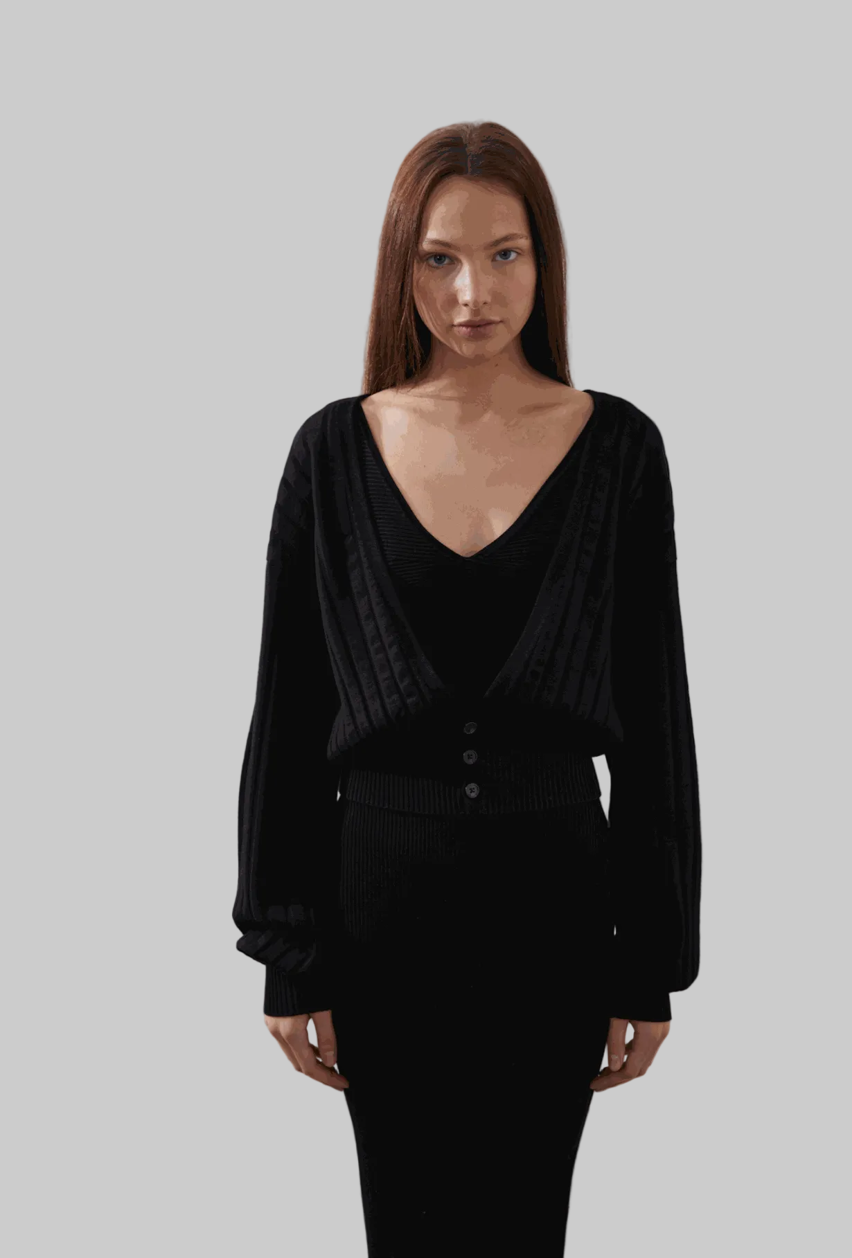 Seren Cardigan in black with deep V-neckline and billowing sleeves.