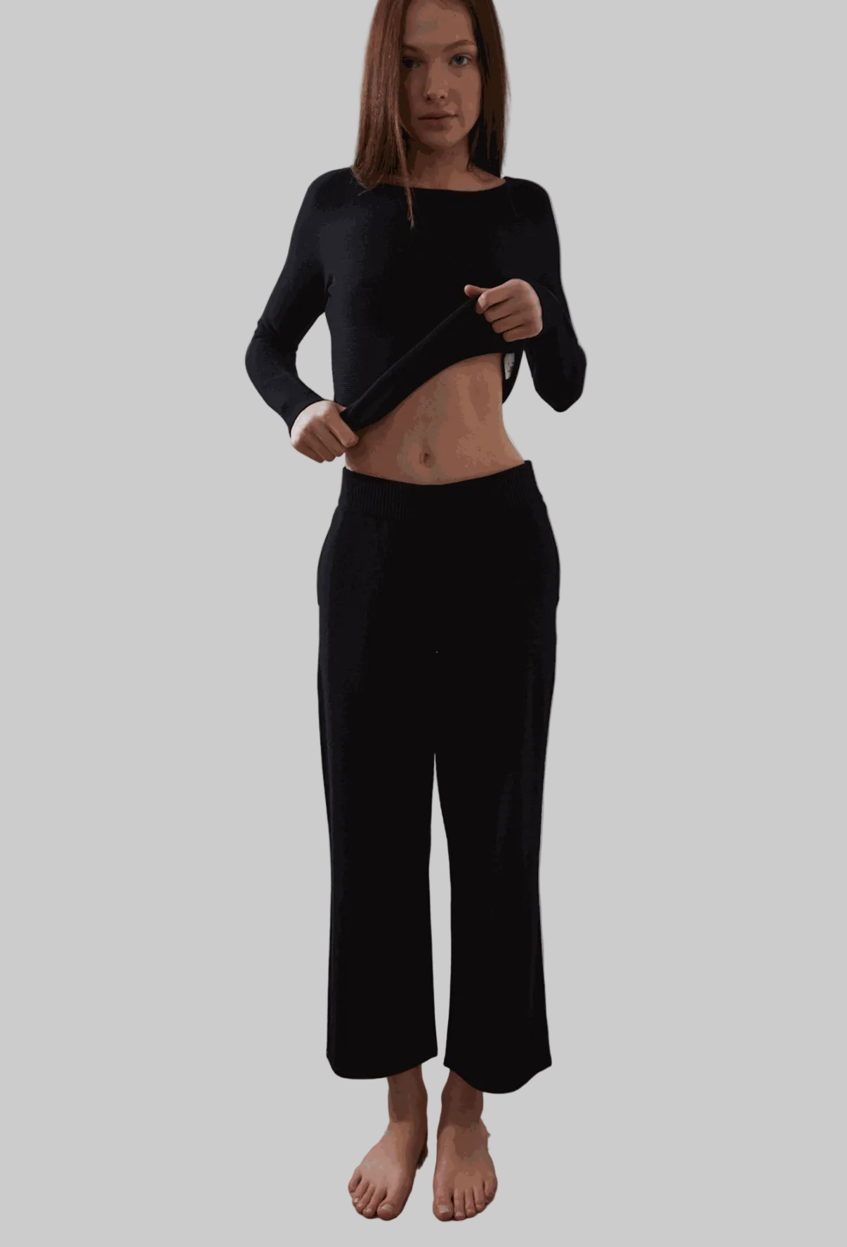 Eclipse Crop Pant in black, ankle length, chic silhouette, elastic waistband, flat side pockets, eco-friendly fabric.